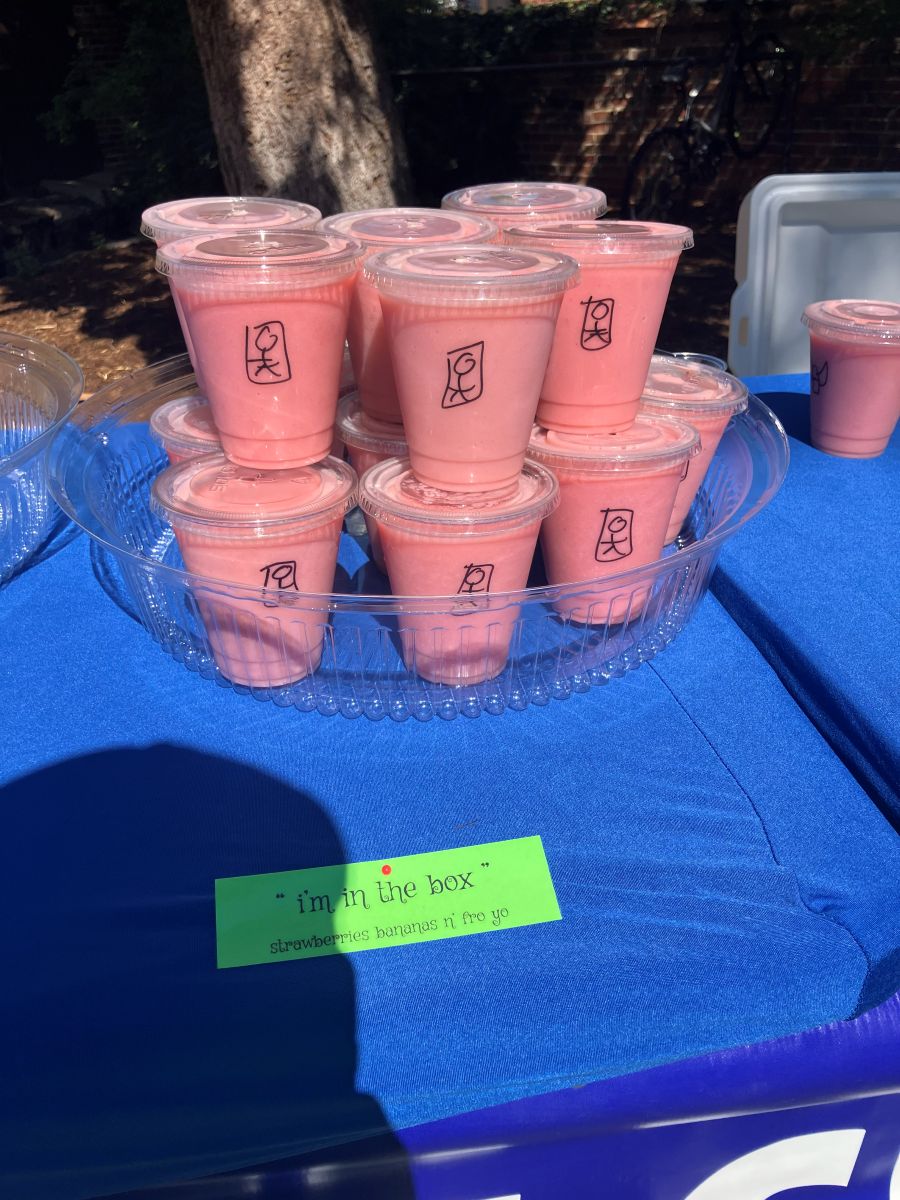 Tray of sample cups, each marked with its hand-drawn symbol